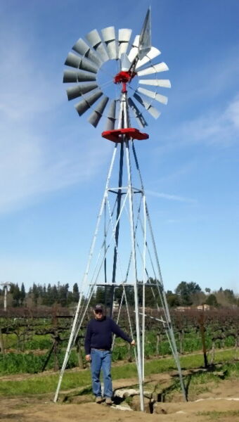 8’ Windmill and 21’ tower with Kevin on Tower