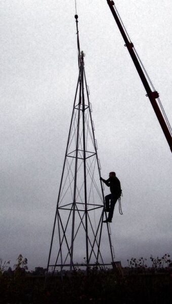 climbing a windmill tower