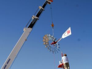 Lifting windmill with sign truck