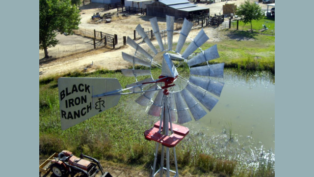 Water pumping windmill at a lake